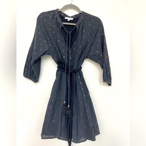 Short black cotton  dress with metal thread details.